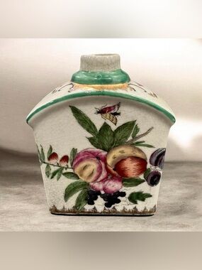 Late 19th Century Chinese ceramic snuff bottle with fruit and butterfly deco.